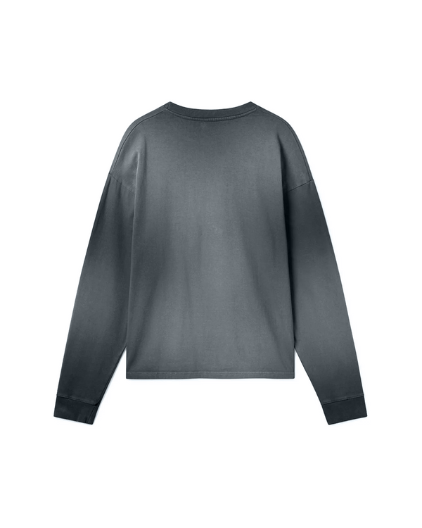 STRENGTH CONQURES ALL OBSTACLES OVERSIZED LONG SLEEVE
